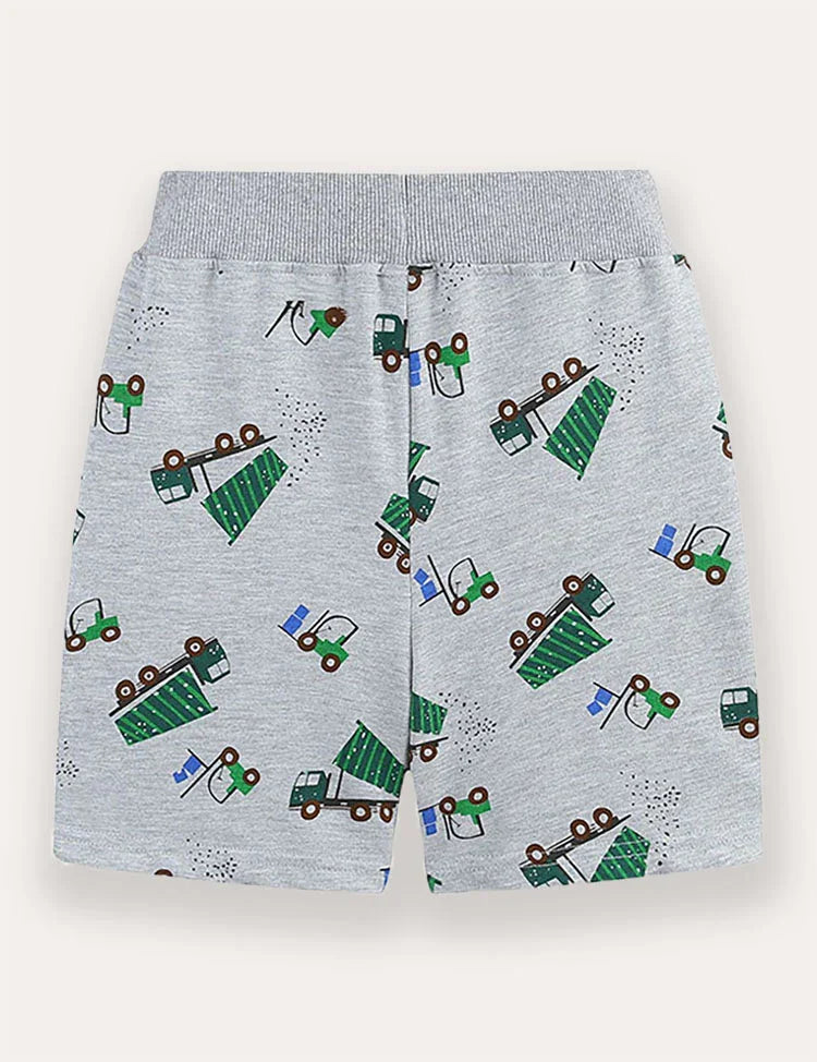 Pantaloncini stampati con camion dei cartoni animati